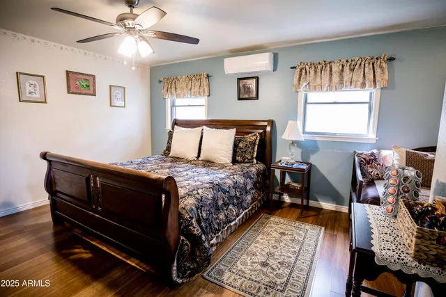 a living room with a couch and a dining table