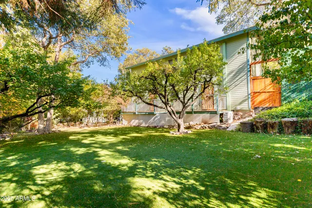 a view of swimming pool with a yard