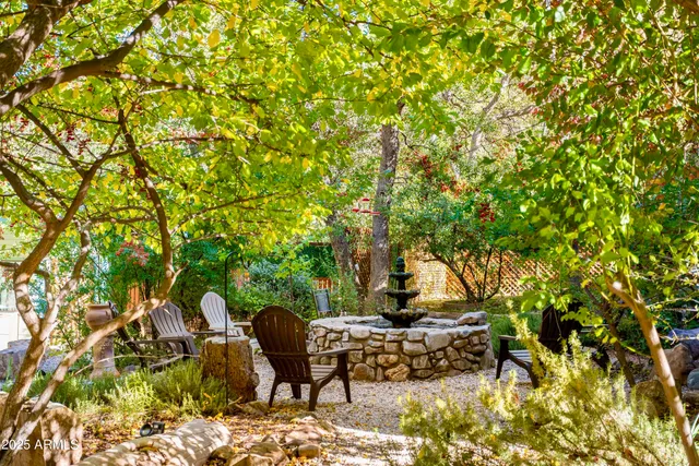 a view of a tree with a yard