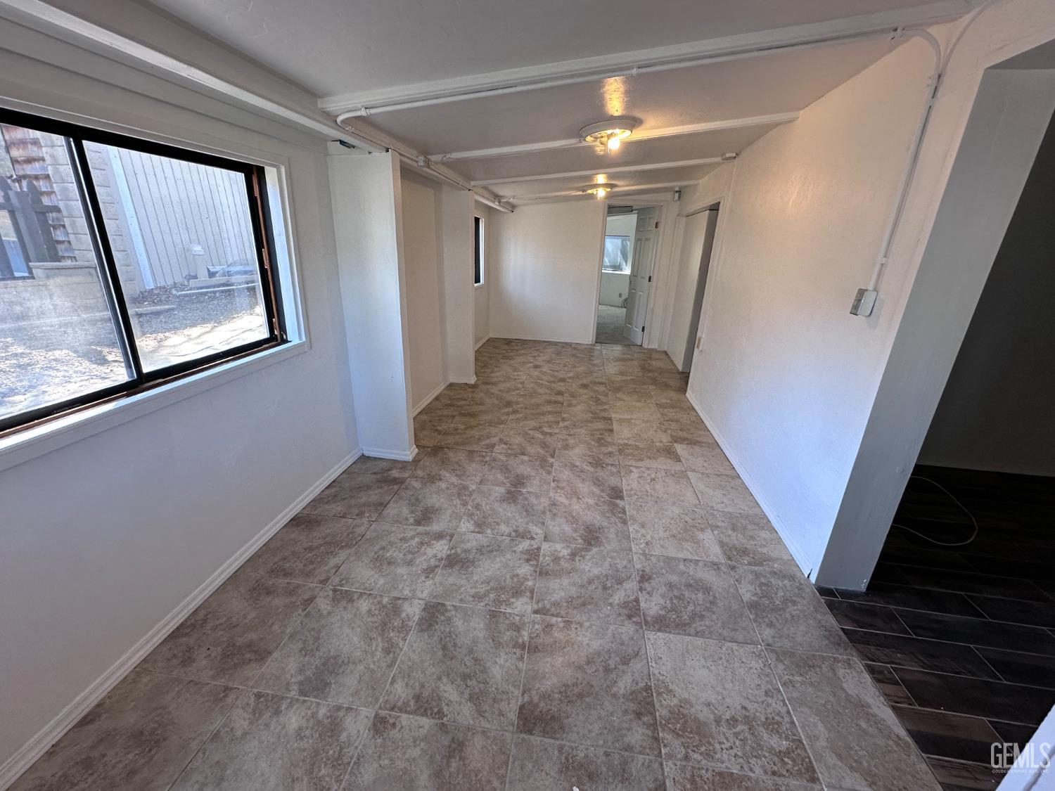 Undisclosed Address Bodfish, CA 93205 - Photo 14 of 61 This is the lifestyle room, looking toward room two on the far end. Then the main bedroom entrance. On the right is the main living room.