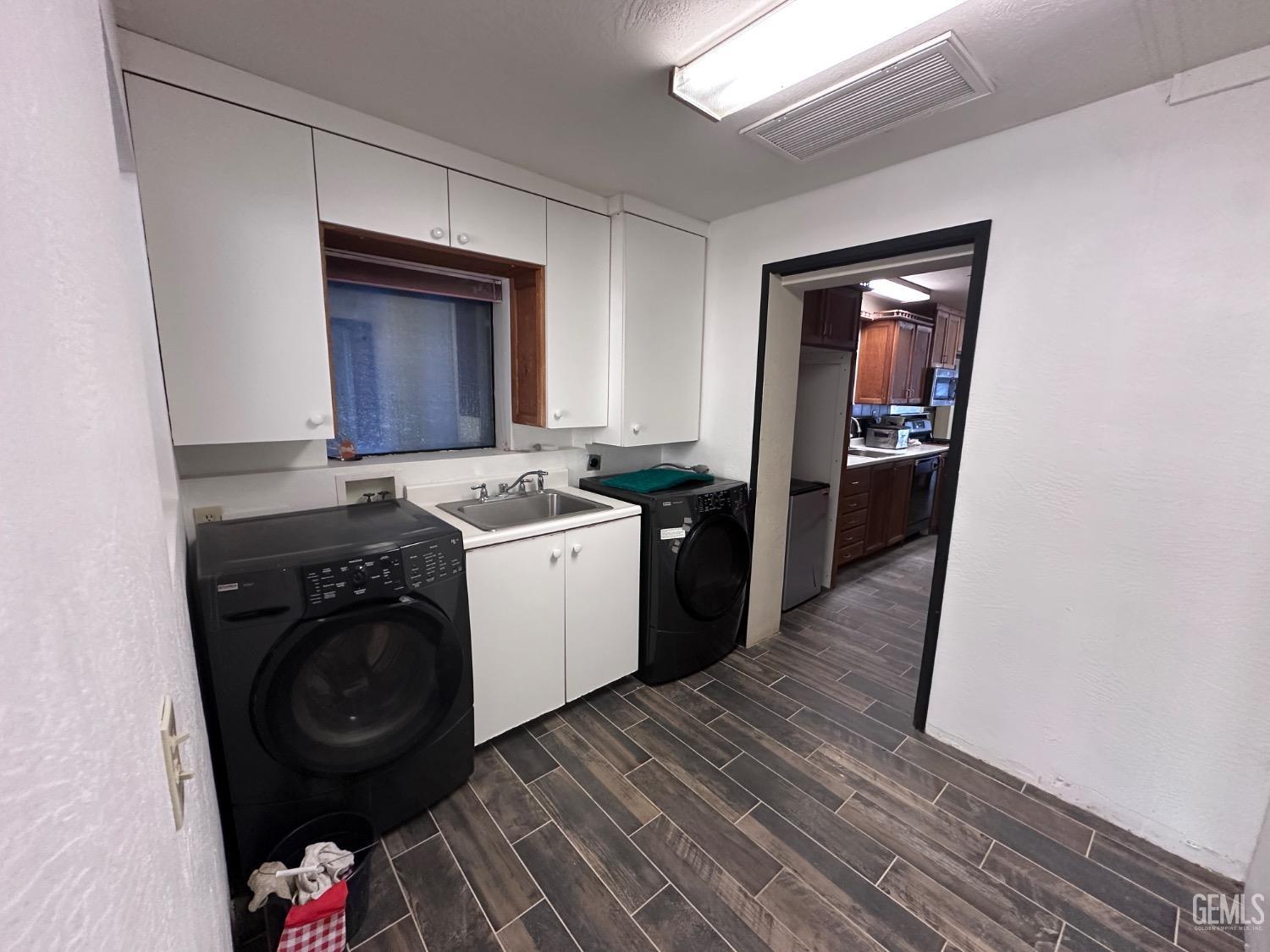 Undisclosed Address Bodfish, CA 93205 - Photo 15 of 61 The laundry room with entrances to the bathroom on the right, the kitchen straight ahead, and behind the cam is the atrium.