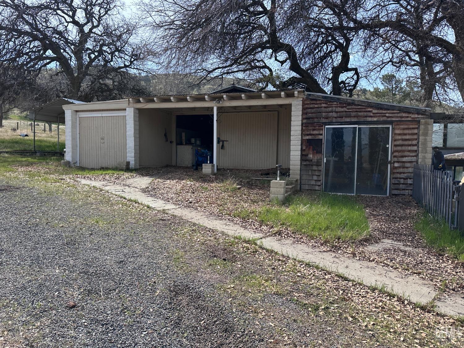 Undisclosed Address Bodfish, CA 93205 - Photo 27 of 61 The shop! Double door storage area on left, shop entrance under the patio, and additional shop area on the right.