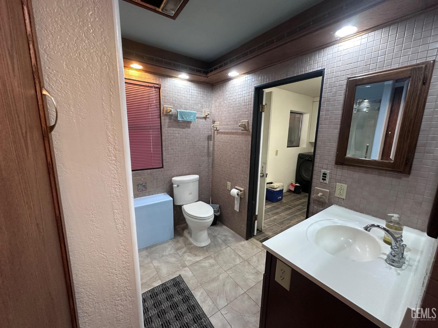 Undisclosed Address Bodfish, CA 93205 - Photo 8 of 61 From the cosmetic space, looking through the bathroom to the laundry room.