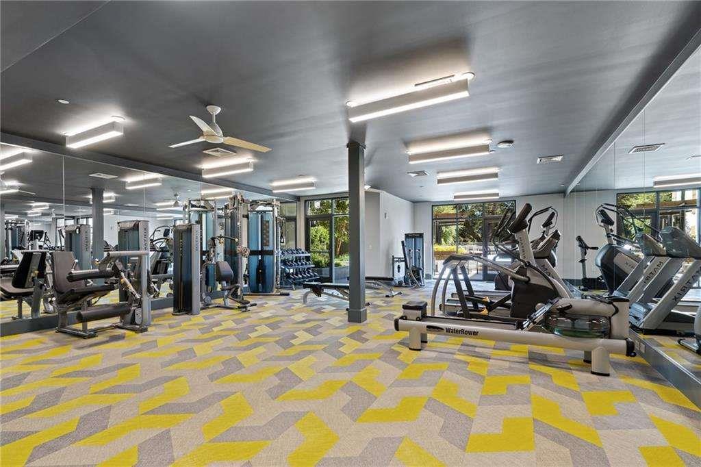 775 Juniper Street Northeast, Unit 111 Atlanta, GA 30308 - Photo 41 of 56 a view of a room with gym equipment