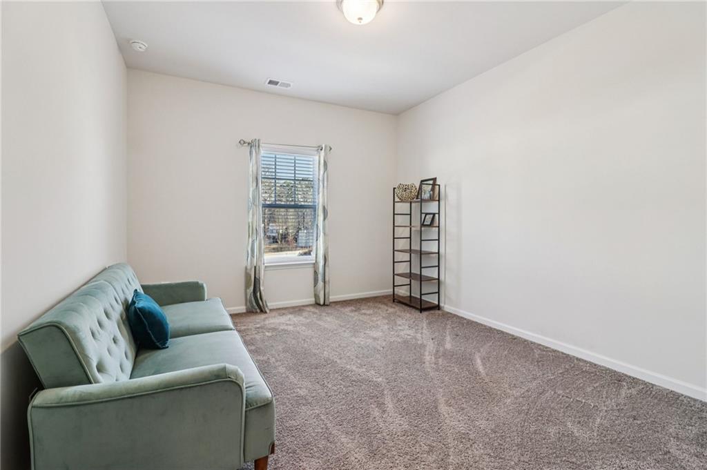 3625 Fairhaven Drive Powder Springs, GA 30127 - Photo 13 of 20 a living room with furniture and a window