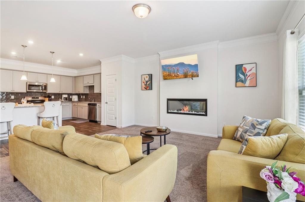 3625 Fairhaven Drive Powder Springs, GA 30127 - Photo 3 of 20 a living room with furniture and kitchen view