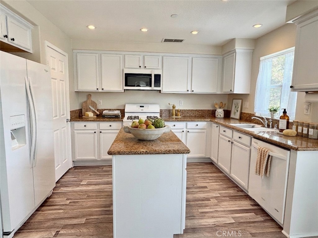 5 Quartz Lane Ladera Ranch, CA 92694 - Photo 9 of 53 Virtually staged enerously sized kitchen with pantry kitchen