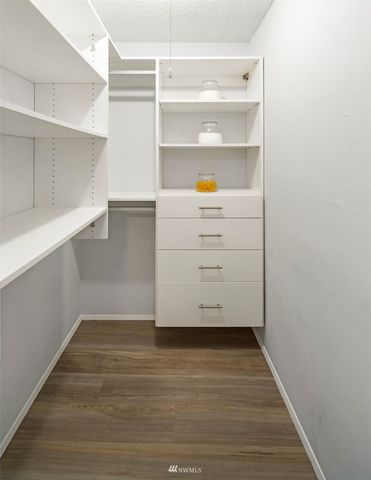 a view of an empty walk in closet