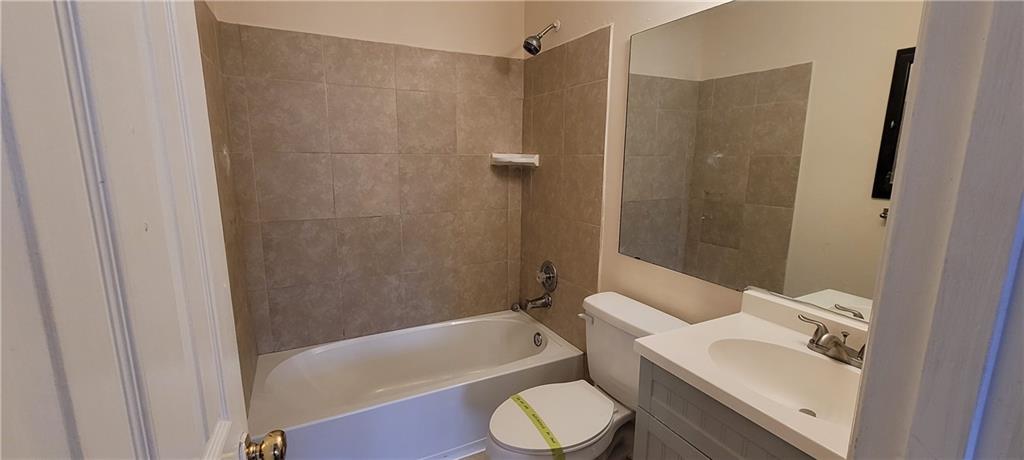 2082 Montgomery Trail Duluth, GA 30096 - Photo 24 of 31 a bathroom with a sink toilet and shower