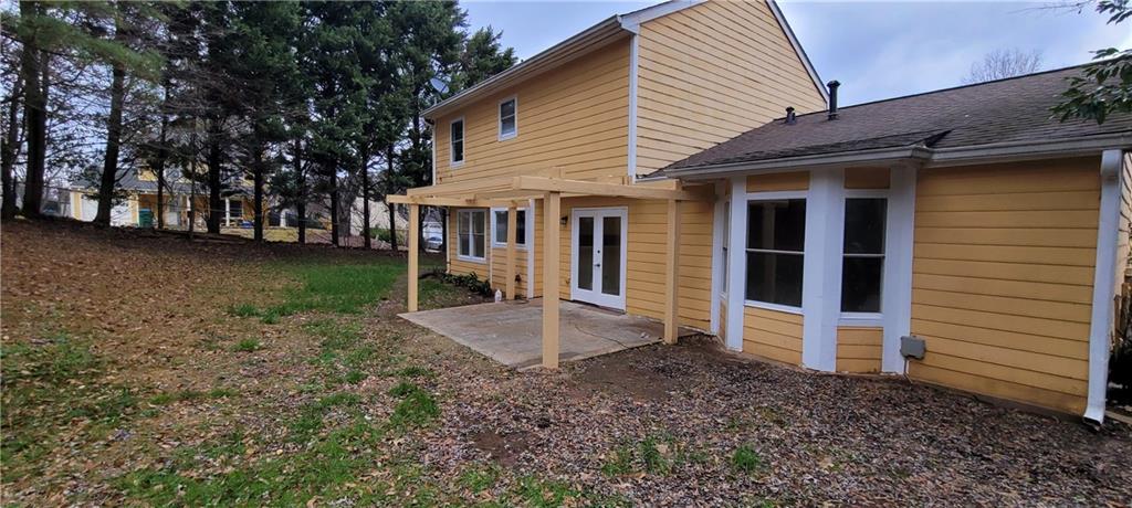 2082 Montgomery Trail Duluth, GA 30096 - Photo 31 of 31 a view of a house with backyard and garden