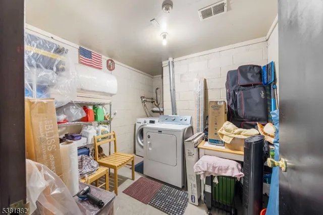 a storage room with washer and dryer