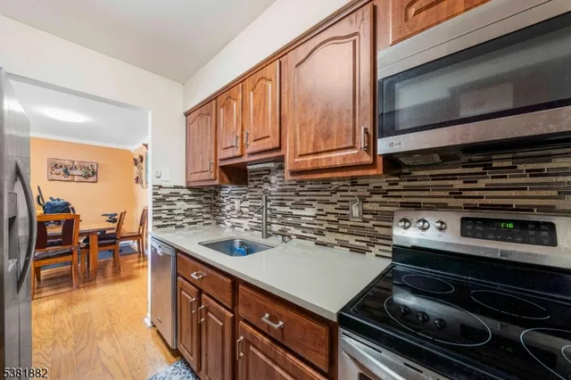 a kitchen with a stove and a microwave