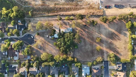 a aerial view of residential houses with outdoor space