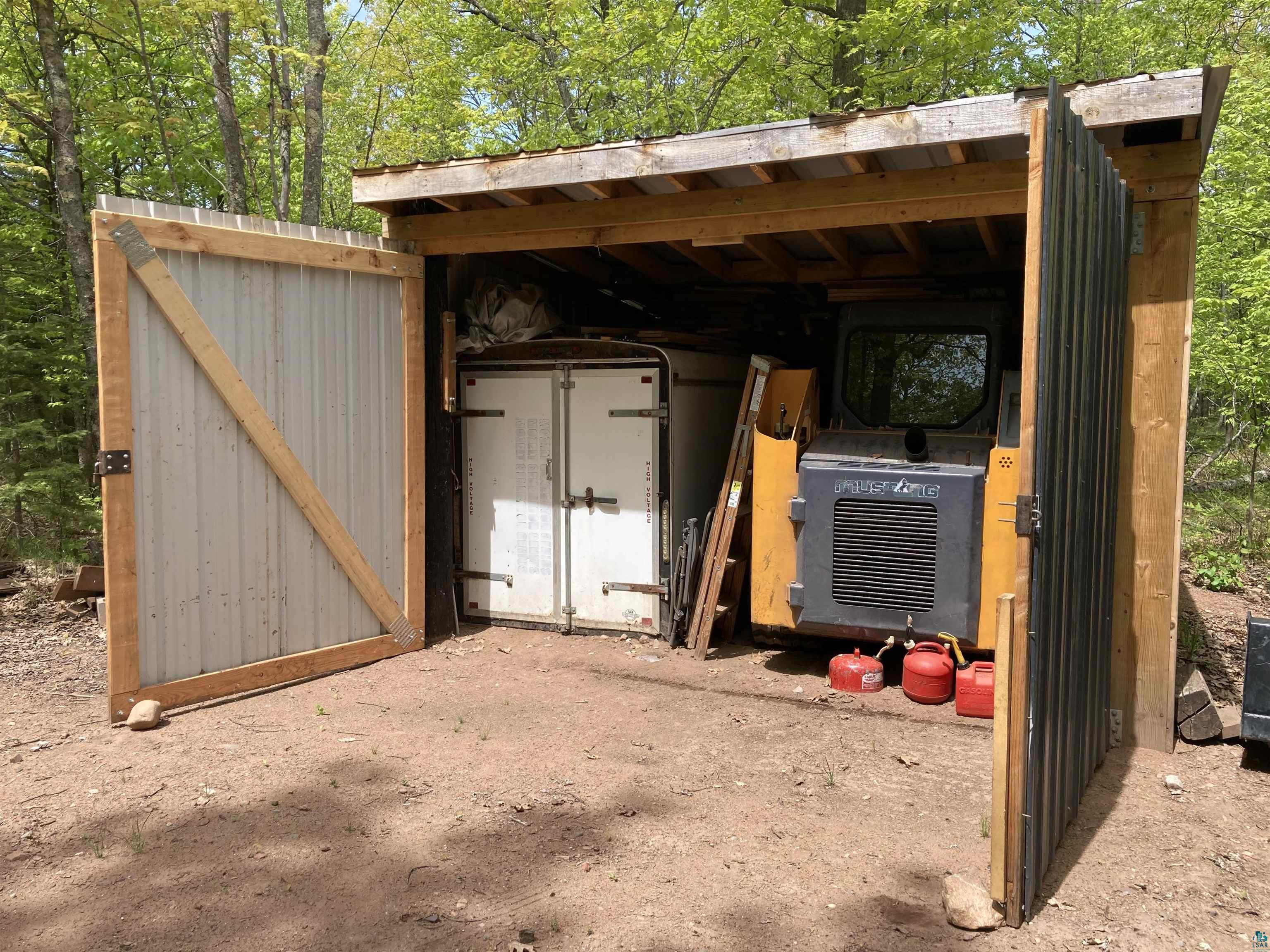 14334 East Eagle Ridge Brule, WI 54820 - Photo 12 of 26 View of outbuilding with a carport