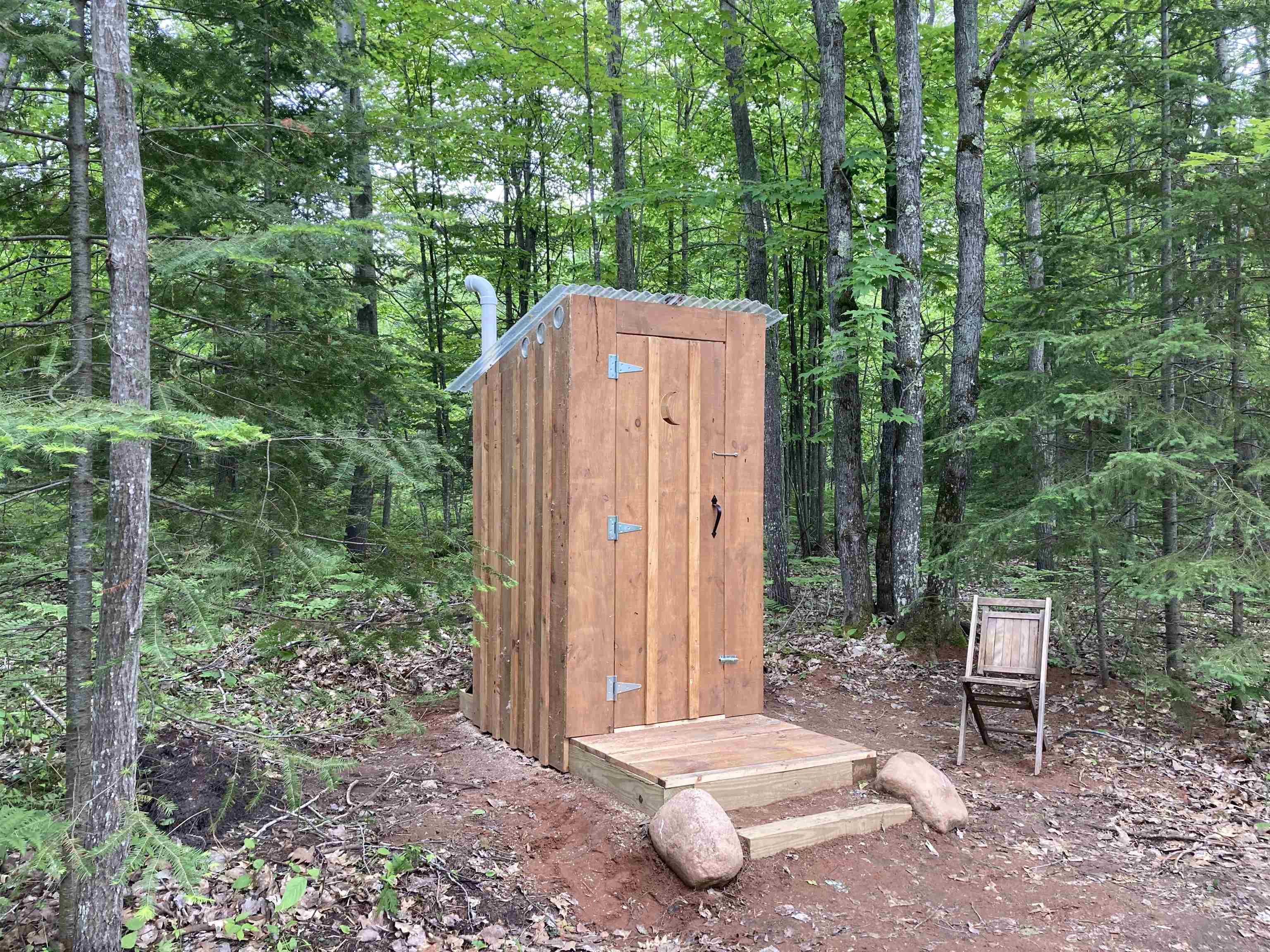14334 East Eagle Ridge Brule, WI 54820 - Photo 14 of 26 View of shed featuring a wooded view