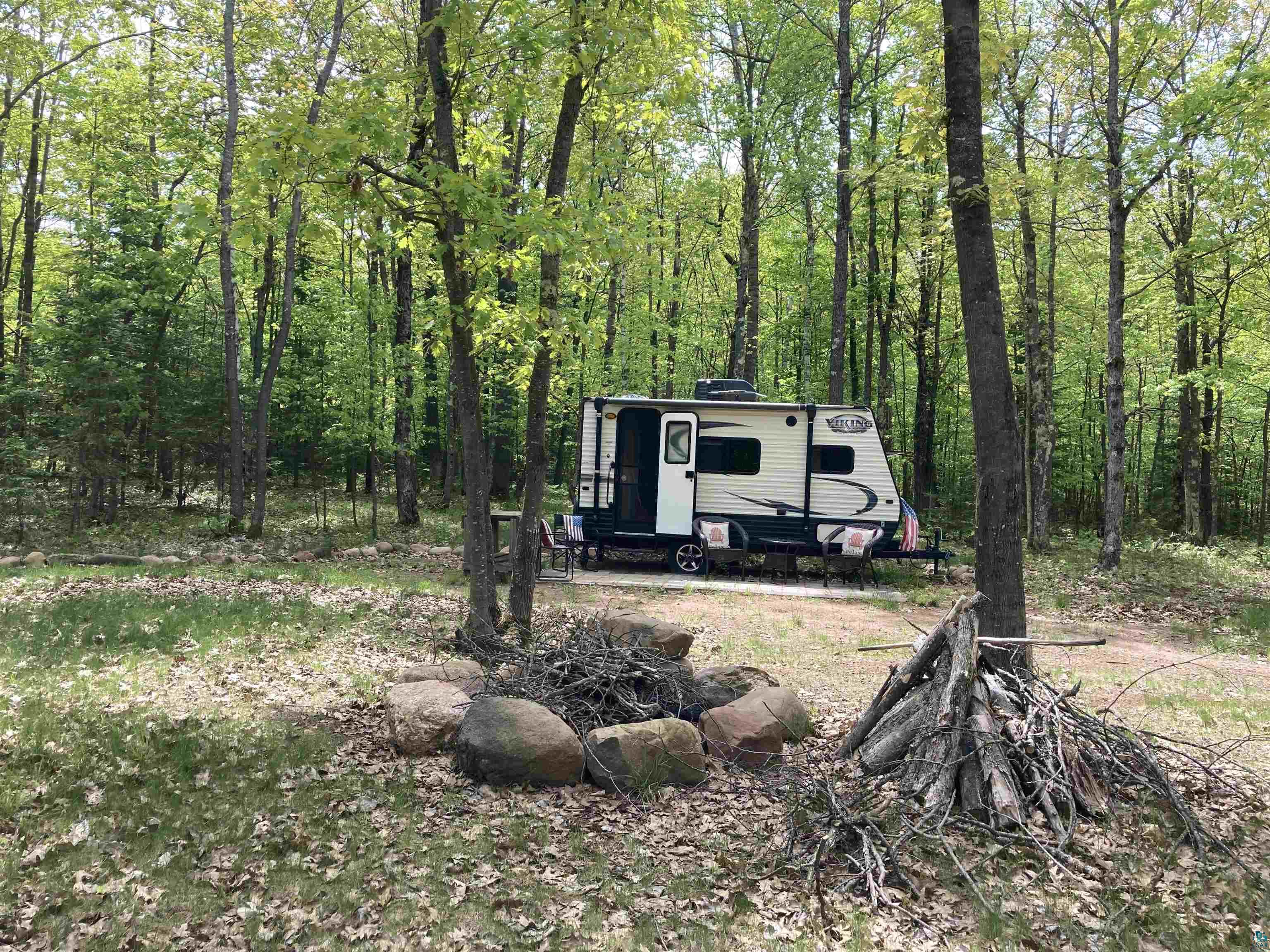14334 East Eagle Ridge Brule, WI 54820 - Photo 2 of 26 View of yard with a view of trees