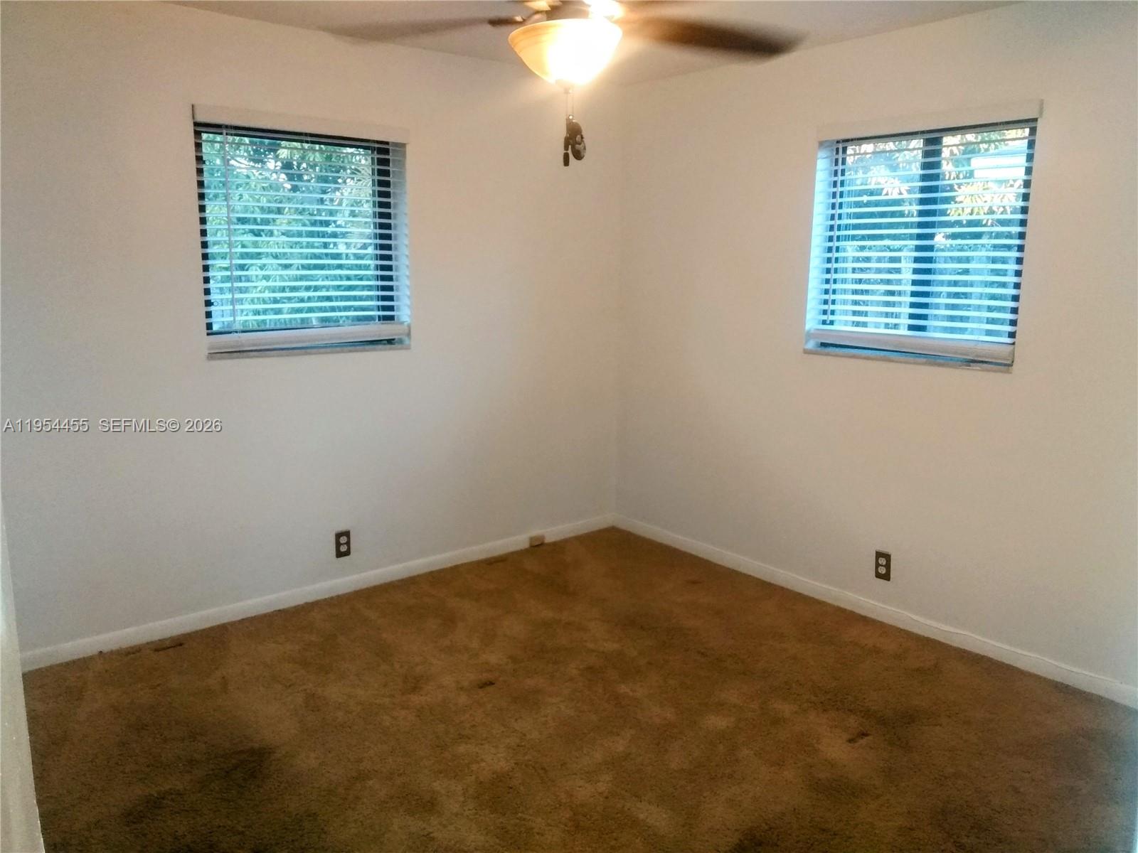4411 Northwest 15th Street Lauderhill, FL 33313 - Photo 11 of 14 an empty room with a window