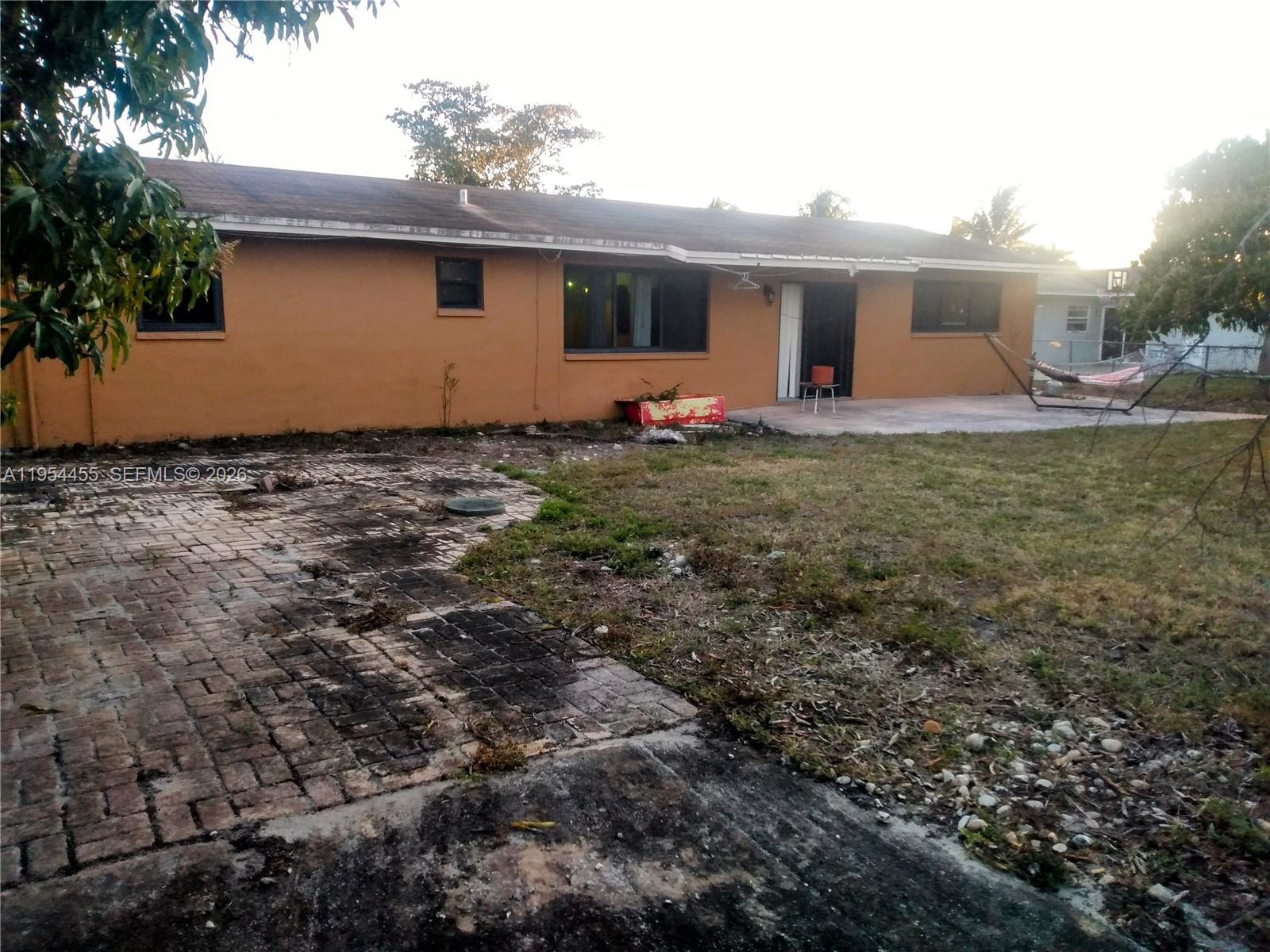 4411 Northwest 15th Street Lauderhill, FL 33313 - Photo 13 of 14 a view of a house with backyard and garden
