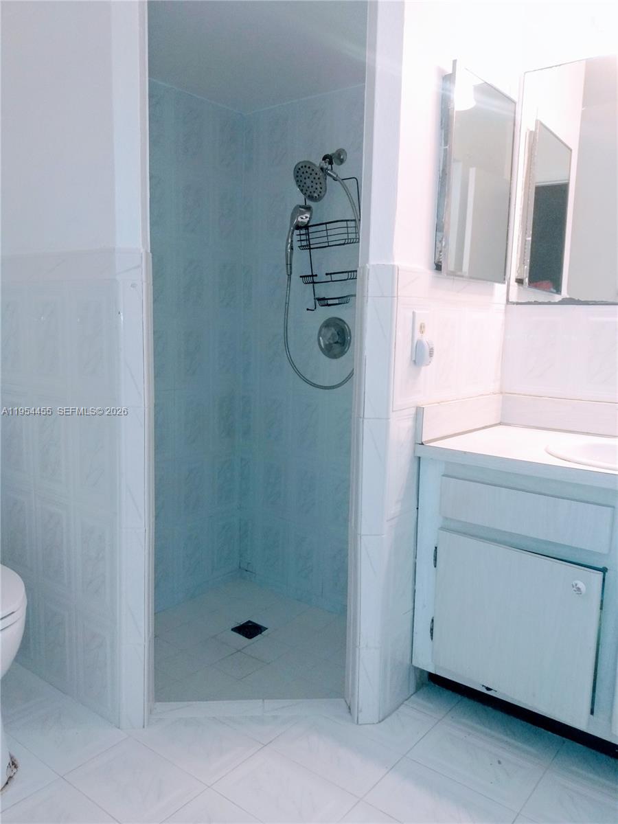 4411 Northwest 15th Street Lauderhill, FL 33313 - Photo 6 of 14 a bathroom with a shower