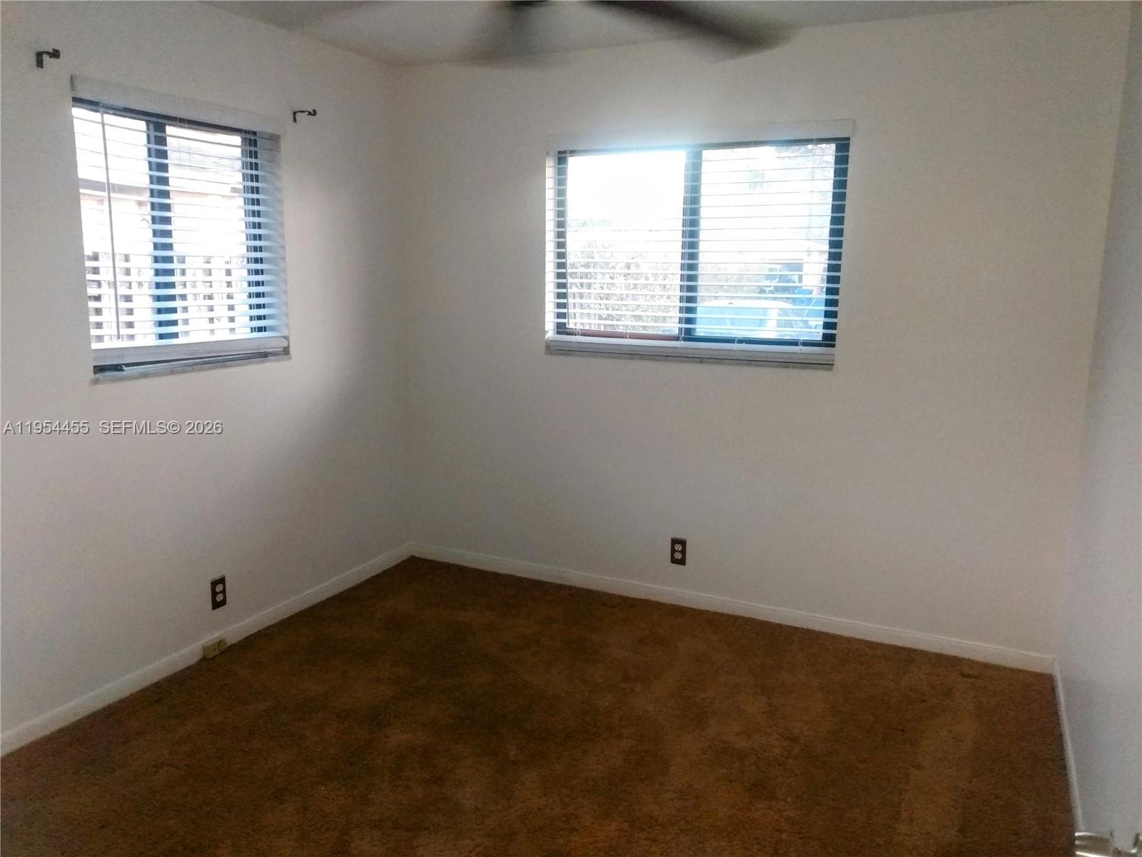 4411 Northwest 15th Street Lauderhill, FL 33313 - Photo 10 of 14 an empty room with a window