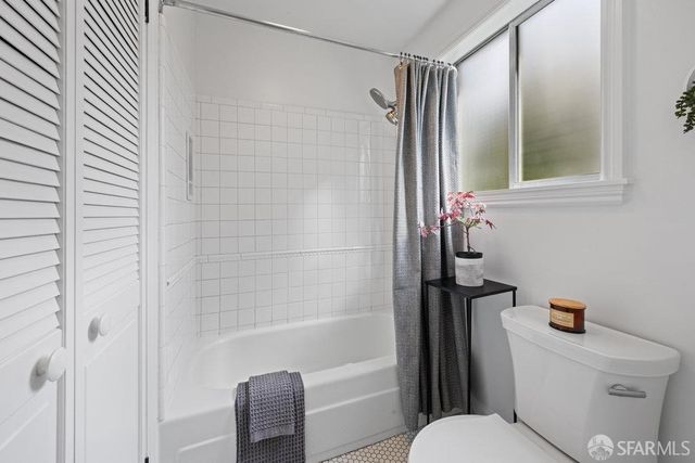 a view of a balcony with chairs