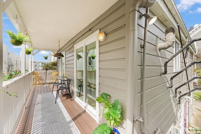 a flower plants in front of a house