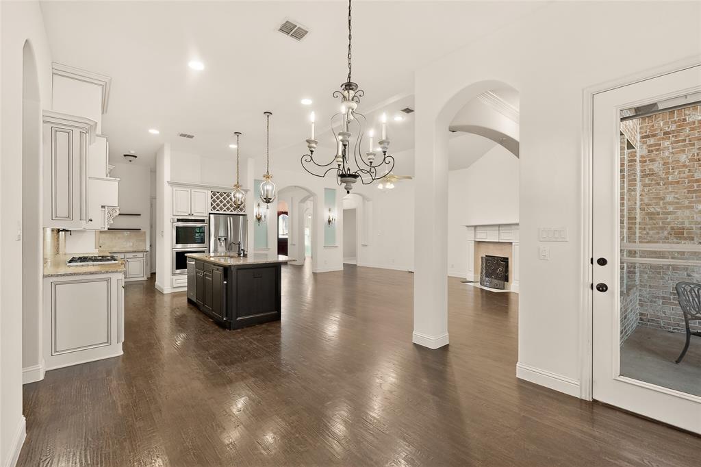 11048 Riney Court Frisco, TX 75035 - Photo 17 of 40 a view of a kitchen and a chandelier