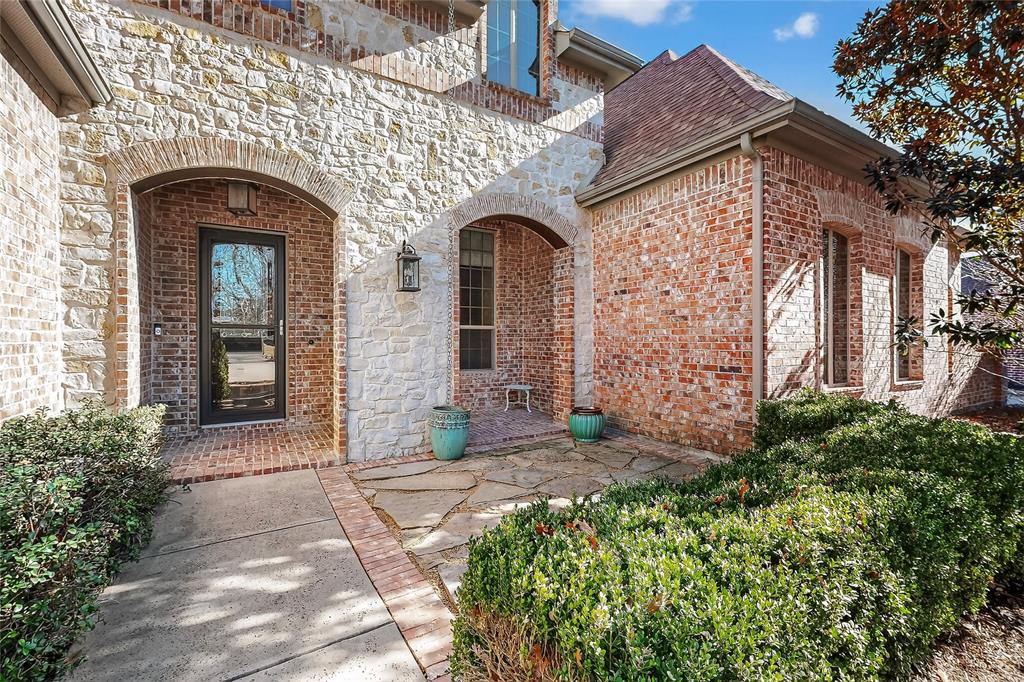 11048 Riney Court Frisco, TX 75035 - Photo 2 of 40 a front view of a house with garden