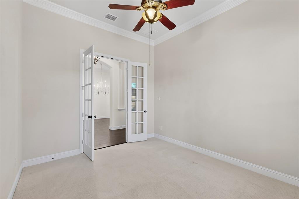 11048 Riney Court Frisco, TX 75035 - Photo 29 of 40 an empty room with chandelier fan and closet