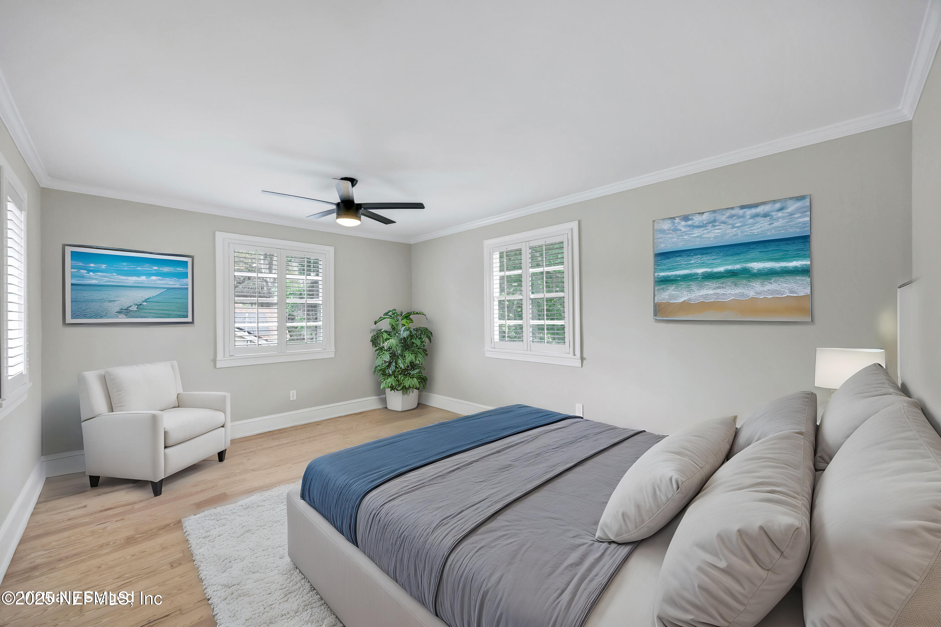 1210 Inwood Terrace Jacksonville, FL 32207 - Photo 39 of 48 a bedroom with a large bed couch and a window