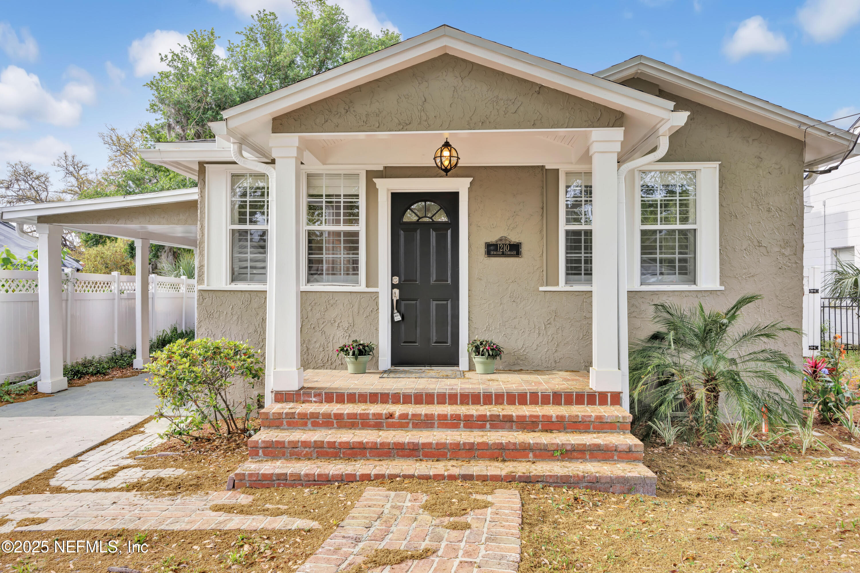 1210 Inwood Terrace Jacksonville, FL 32207 - Photo 43 of 48 a front view of a house with a yard