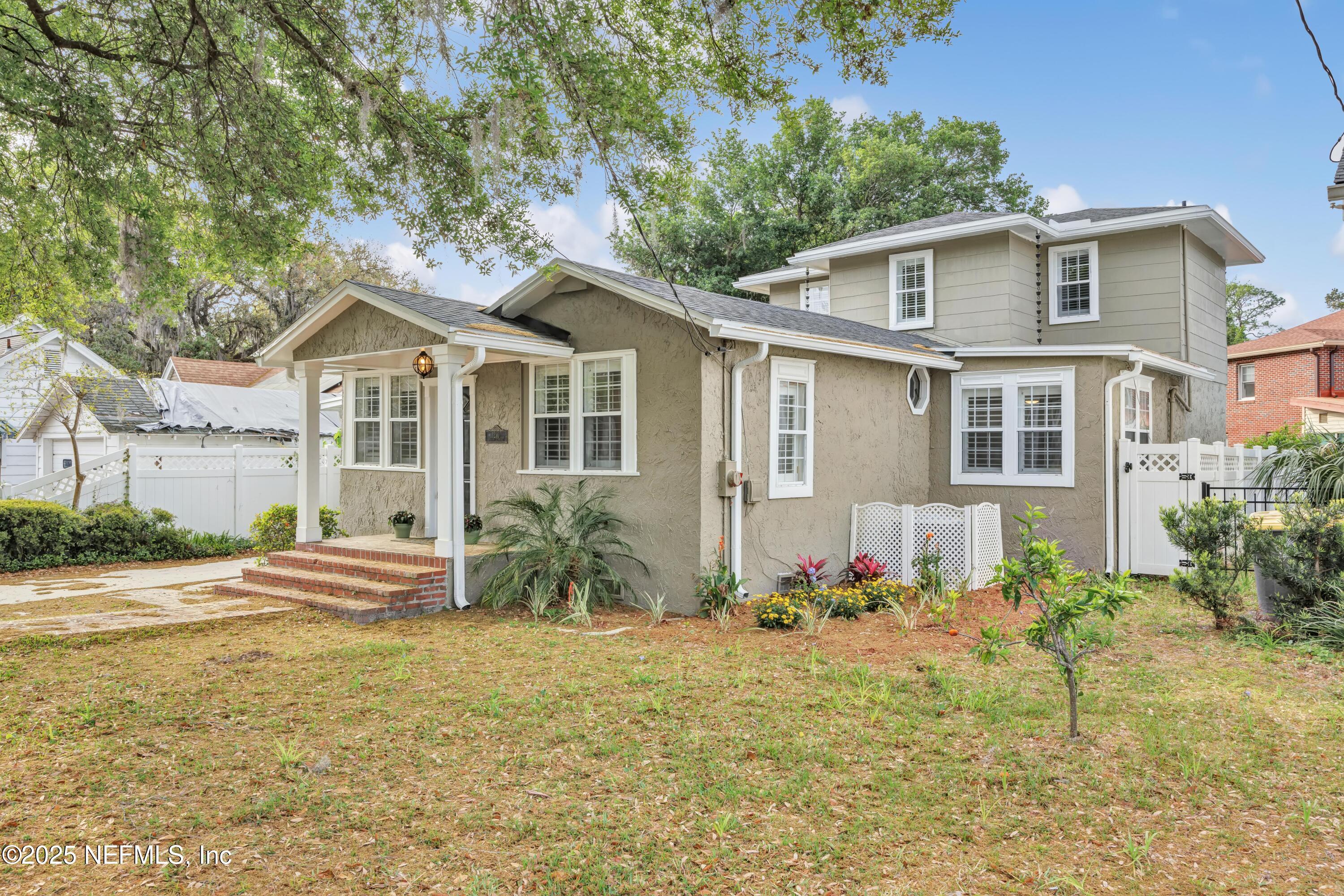 1210 Inwood Terrace Jacksonville, FL 32207 - Photo 45 of 48 a front view of a house with garden