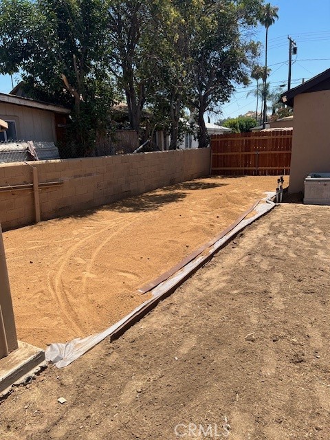 7563 Lincoln Avenue Riverside, CA 92504 - Photo 17 of 34 a view of backyard with large trees