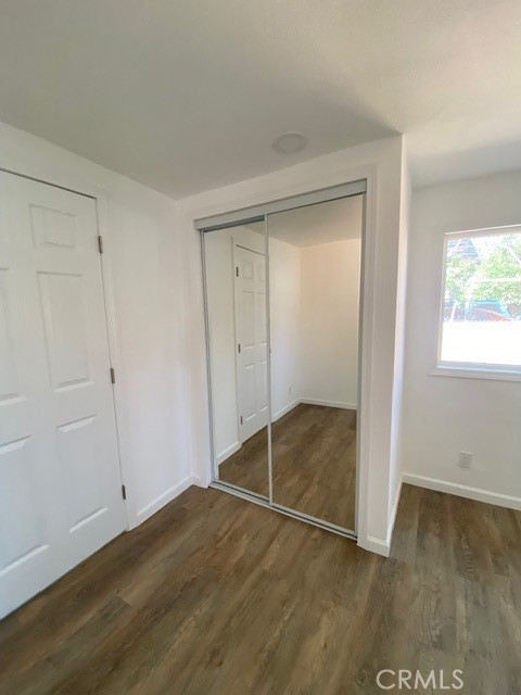 7563 Lincoln Avenue Riverside, CA 92504 - Photo 21 of 34 a view of empty room with wooden floor