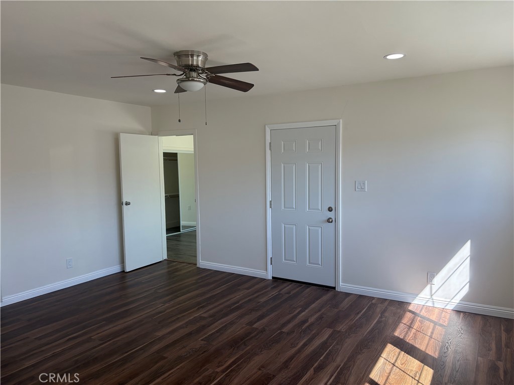 7563 Lincoln Avenue Riverside, CA 92504 - Photo 3 of 34 wooden floor in an empty room