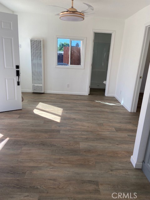 7563 Lincoln Avenue Riverside, CA 92504 - Photo 33 of 34 a view of empty room with wooden floor