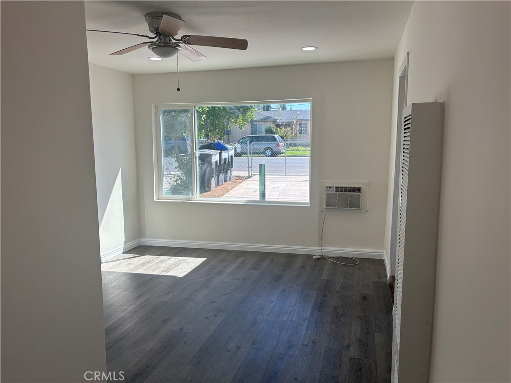 7563 Lincoln Avenue Riverside, CA 92504 - Photo 6 of 34 a view of an empty room with a window