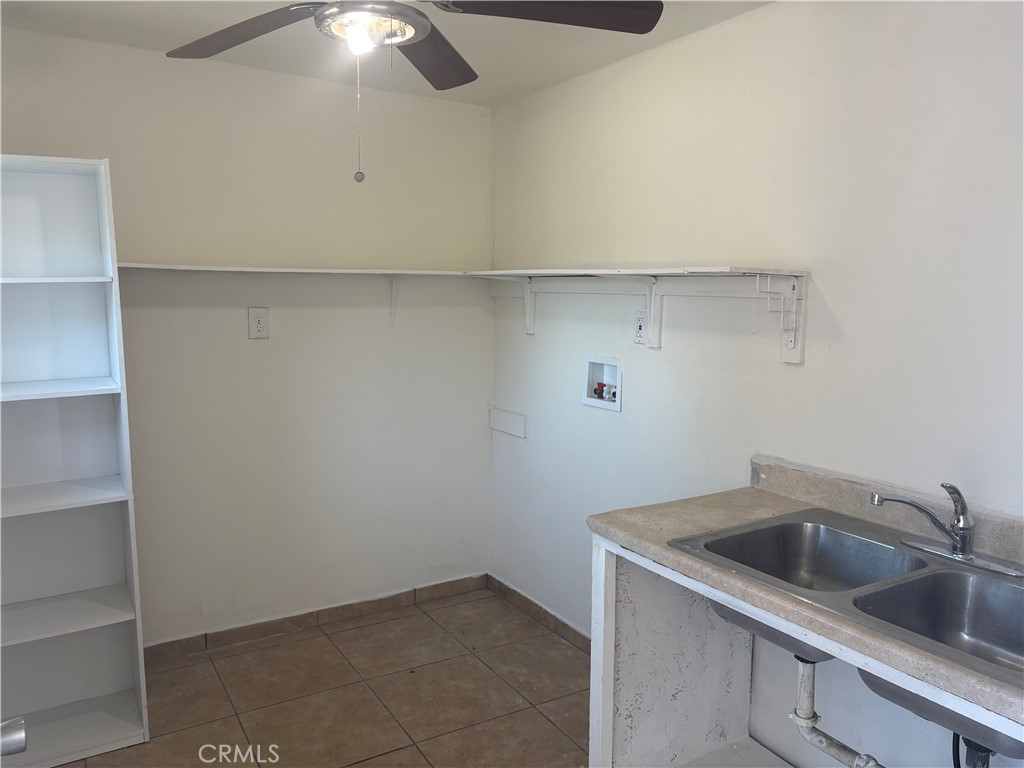 7563 Lincoln Avenue Riverside, CA 92504 - Photo 10 of 34 a view of storage and utility room with closet
