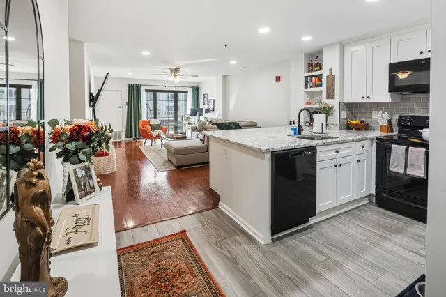a very nice looking dining room with a large window