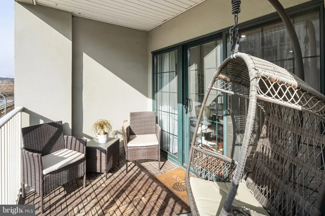 a view of a balcony with city view