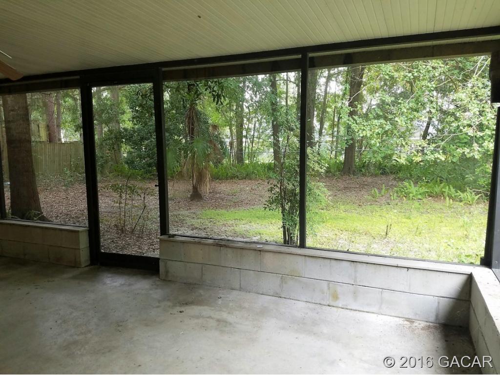 8130 Southwest 12th Place Gainesville, FL 32607 - Photo 20 of 23 Big Screened Porch
