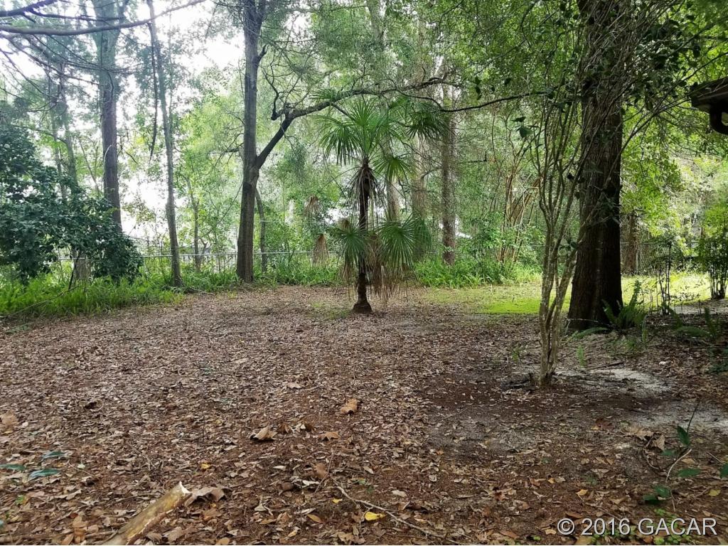 8130 Southwest 12th Place Gainesville, FL 32607 - Photo 21 of 23 Backyard