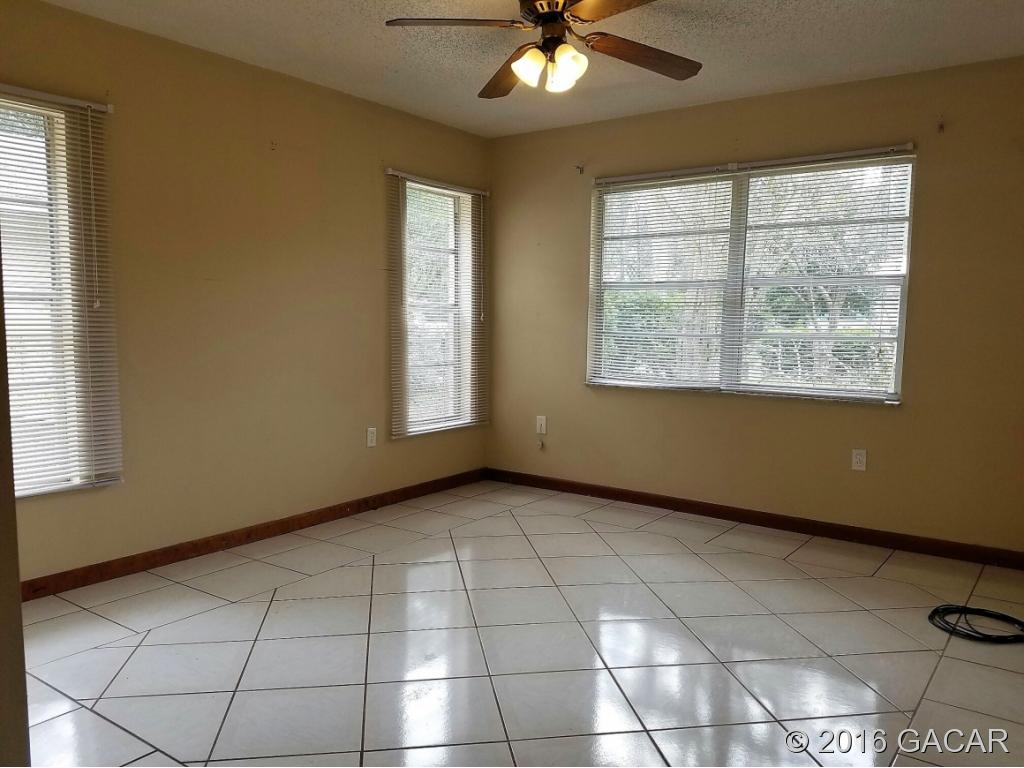 8130 Southwest 12th Place Gainesville, FL 32607 - Photo 4 of 23 Master Bedroom