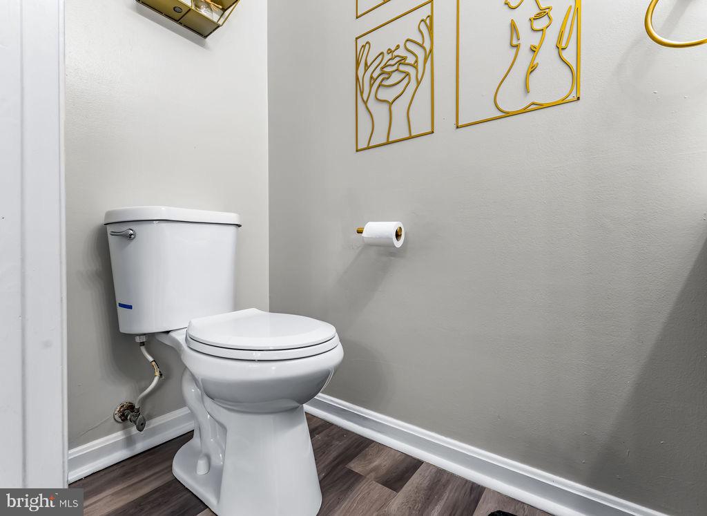 11409 Hermosa Drive Laurel, MD 20708 - Photo 12 of 28 a bathroom with a toilet and a shower