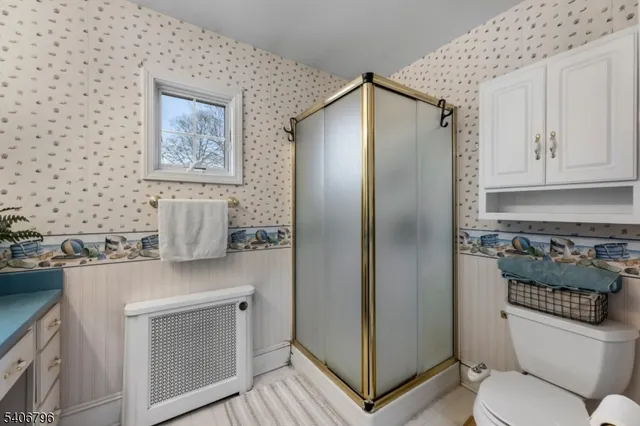 a kitchen with stainless steel appliances a refrigerator and a stove