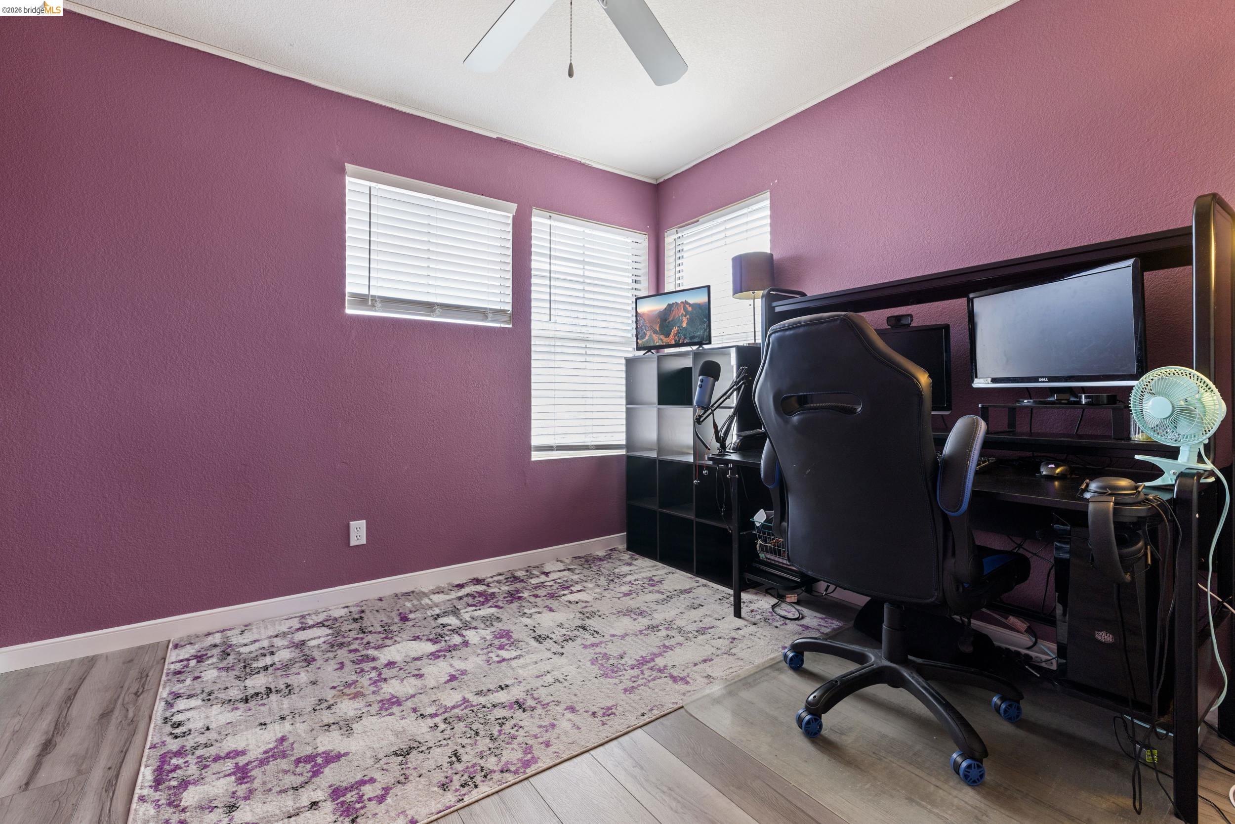 4924 Stirrup Way Antioch, CA 94531 - Photo 19 of 40 a view of a workspace with furniture and a window