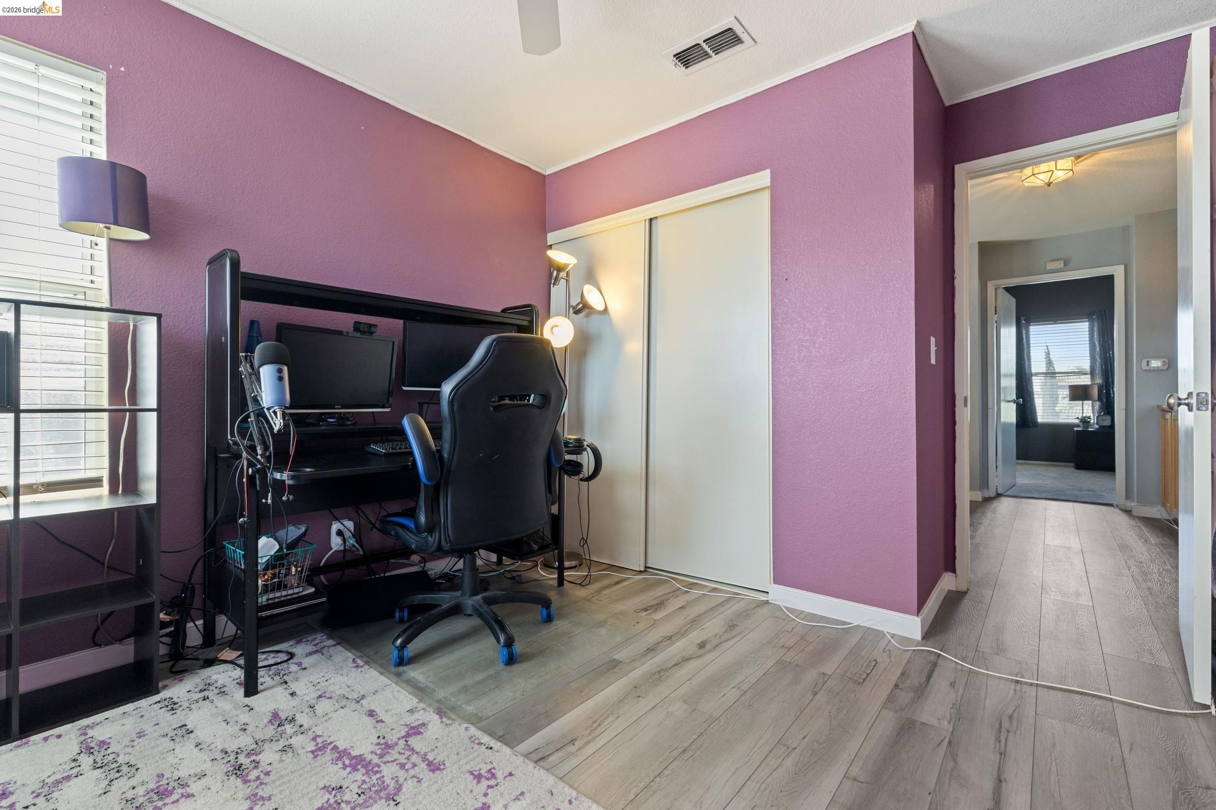 4924 Stirrup Way Antioch, CA 94531 - Photo 20 of 40 a view of room with workspace and windows