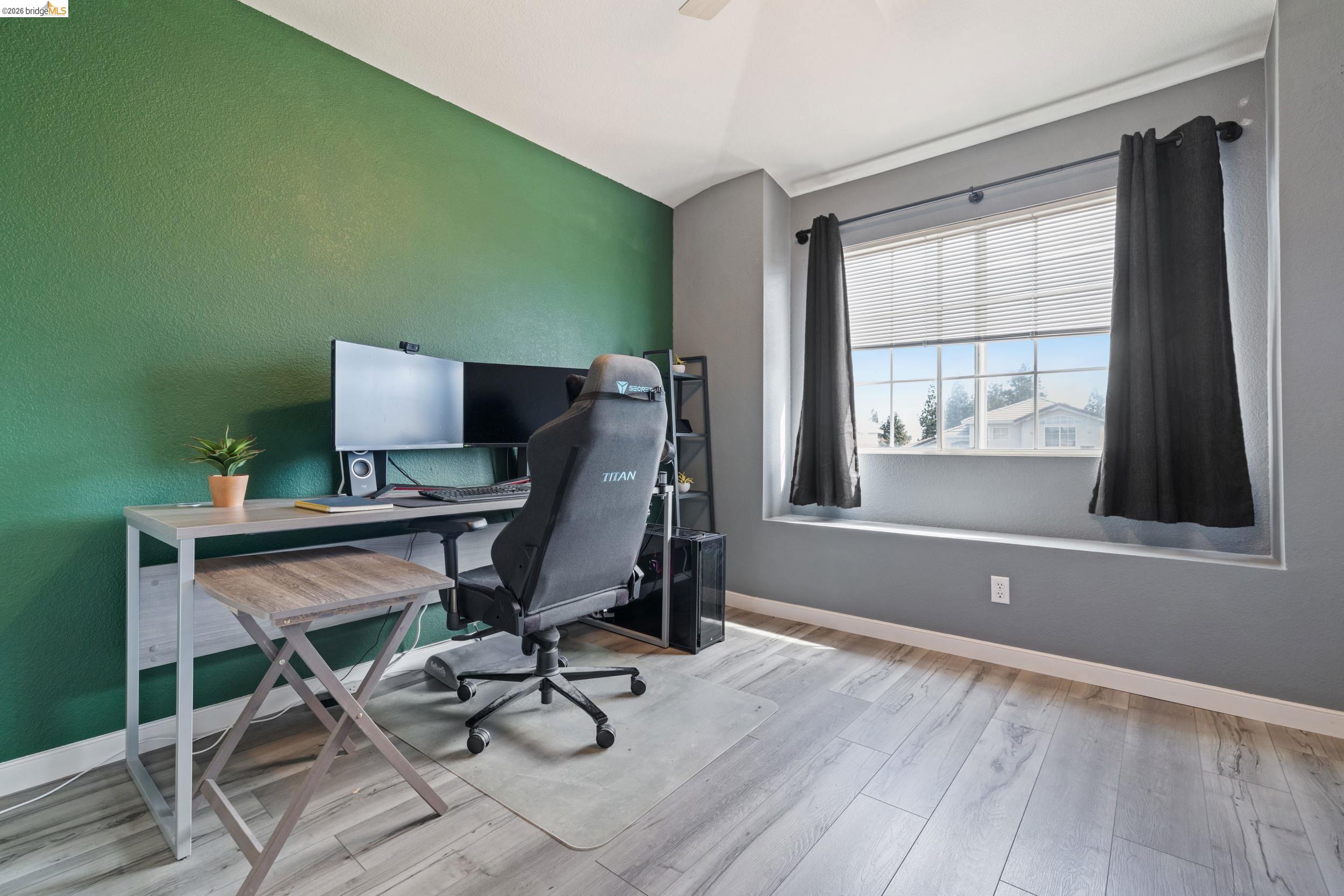 4924 Stirrup Way Antioch, CA 94531 - Photo 22 of 40 a workspace with furniture and a window