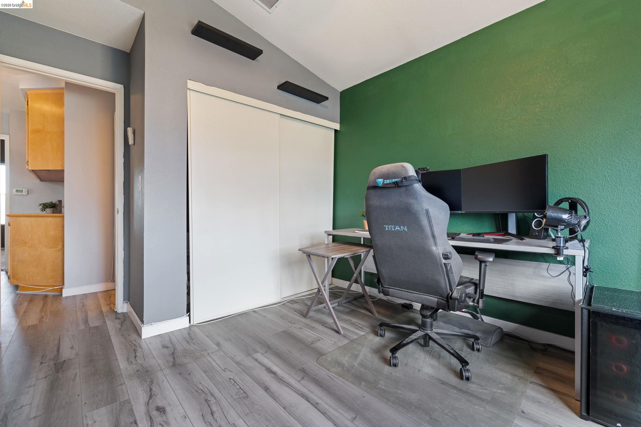 4924 Stirrup Way Antioch, CA 94531 - Photo 23 of 40 a workspace with furniture and wooden floor