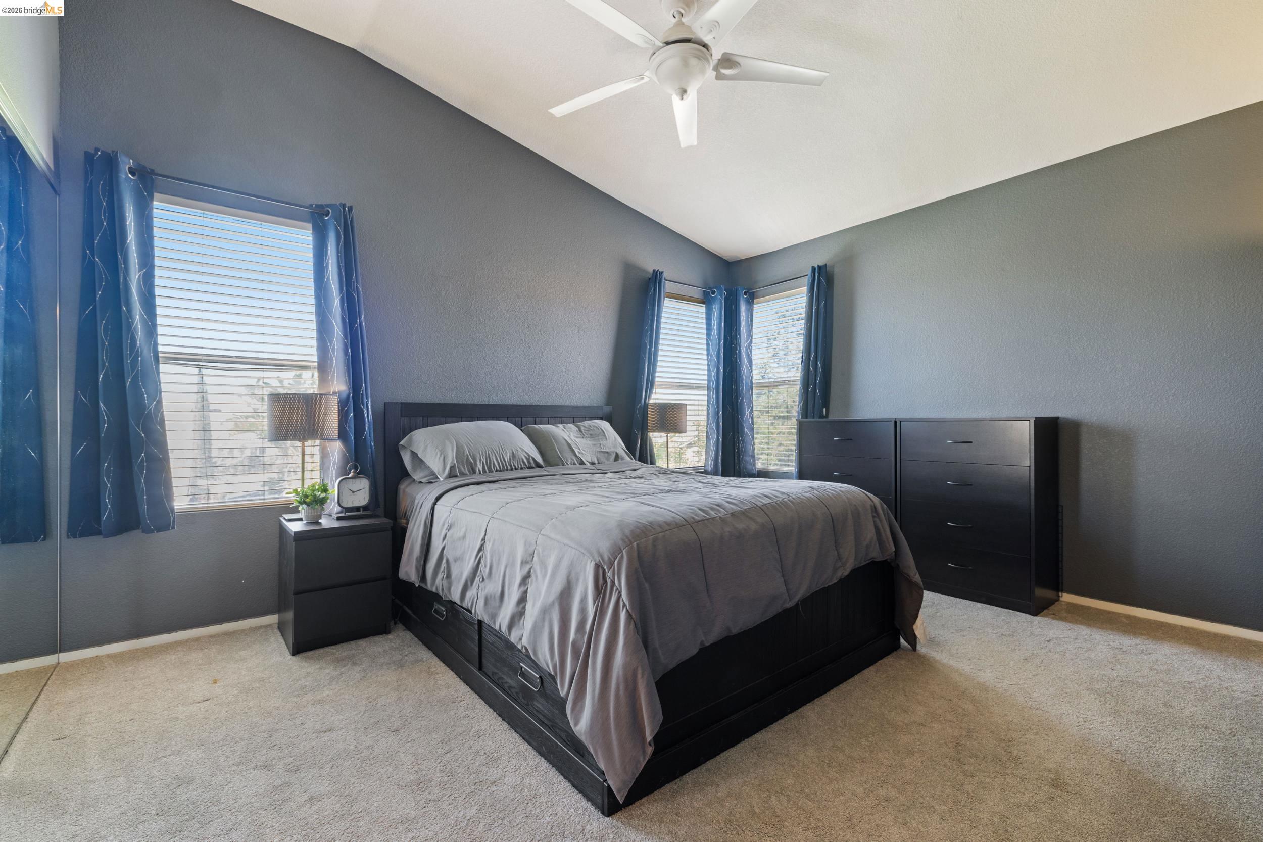 4924 Stirrup Way Antioch, CA 94531 - Photo 24 of 40 a bedroom with a bed and window